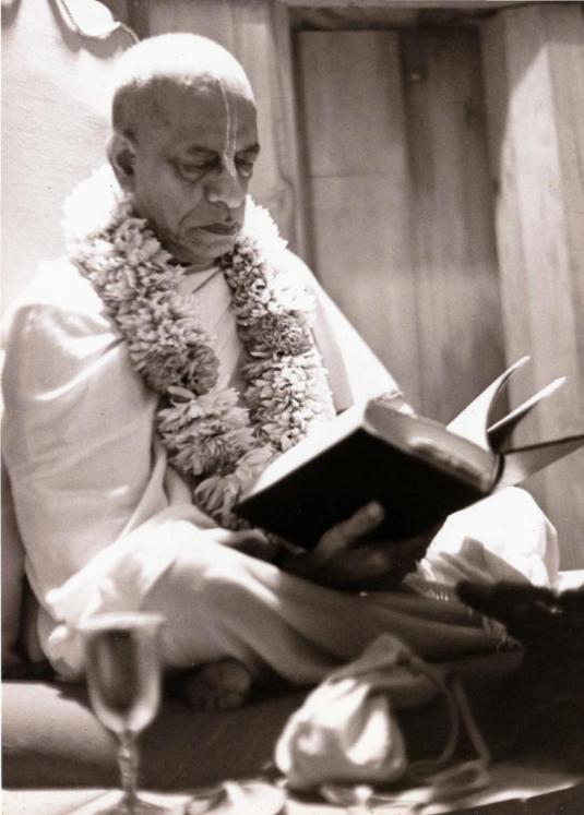 Srila Prabhupada-with-book