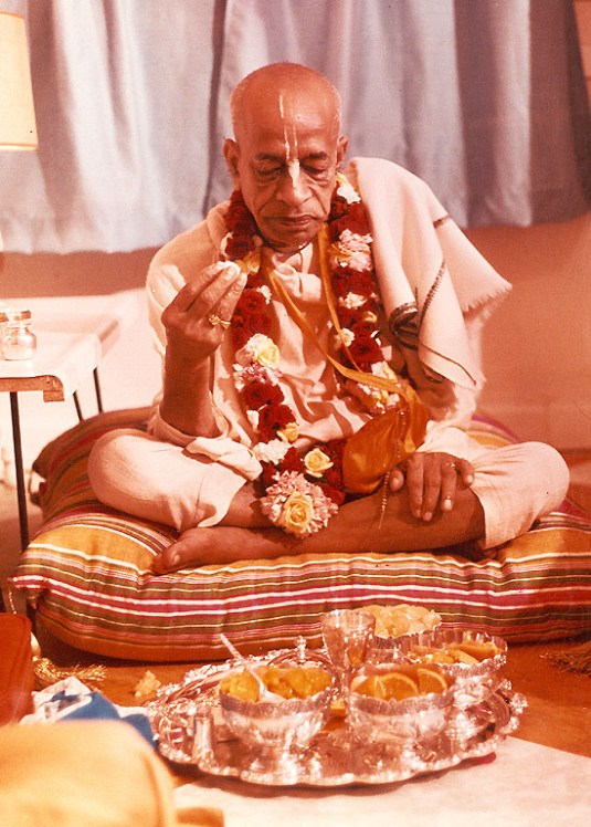Srila Prabhupada taking prasadam